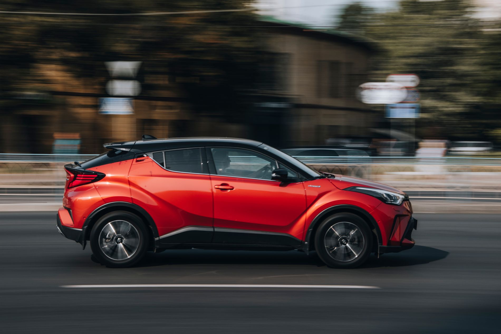 Ukraine, Kyiv 16 July 2021: Red Toyota C HR car moving on the street. Editorial